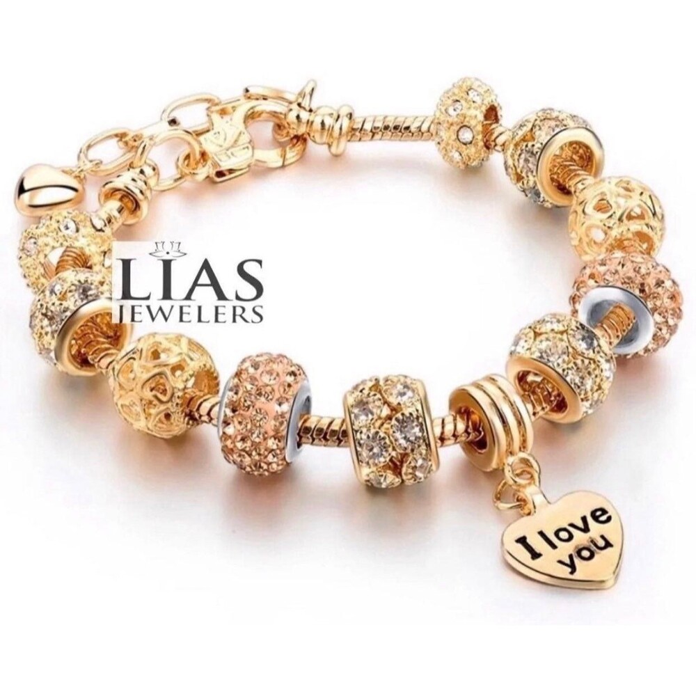 New 18 k yellow gold pandora style bracelet with charms